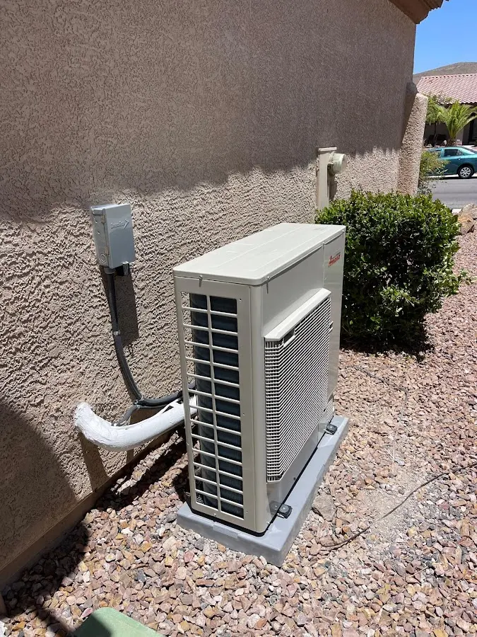 Residential air conditioning condenser unit in Dunbar